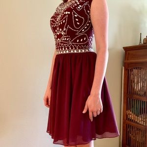 Beaded homecoming dress in purple.